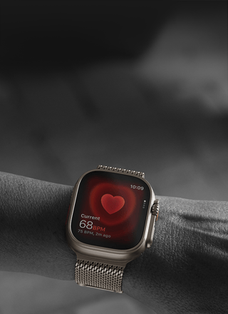 Person wearing Apple Watch Ultra 3 on wrist, possible hypertension health alert screen