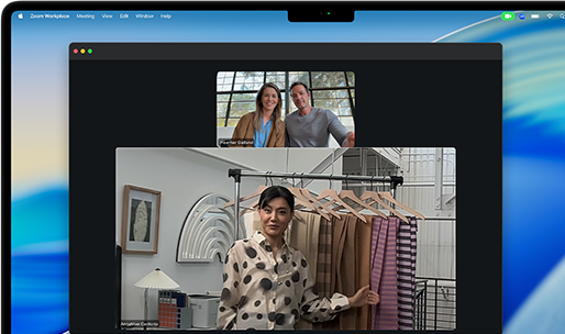 A video call on a MacBook Pro where a woman shows fabrics to two people on the call, with Centre Stage keeping her centred in the frame as she moves around