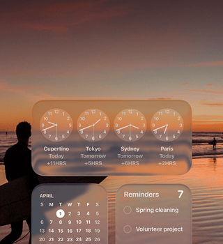 Liquid Glass Clock, Calendar, Reminders and Weather widgets on macOS Tahoe screen over a scene of a surfer walking on the beach at sunset
